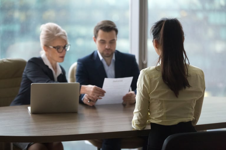 Female candidate interview with HR managers in office stock photo
