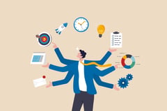image of a businessman juggling images of several different work responsibilities