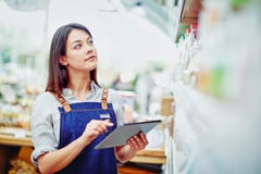 manager taking inventory of her business