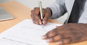 Employer fills out document for OSHA recordkeeping