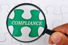 magnifying-glass-hr-compliance.jpg