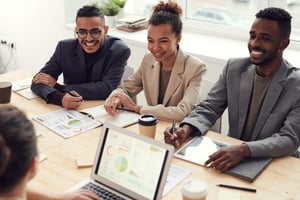 smiling employees are recognized for their achievements 