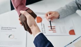 Small business owner partners with a Professional Employer Organization (PEO)