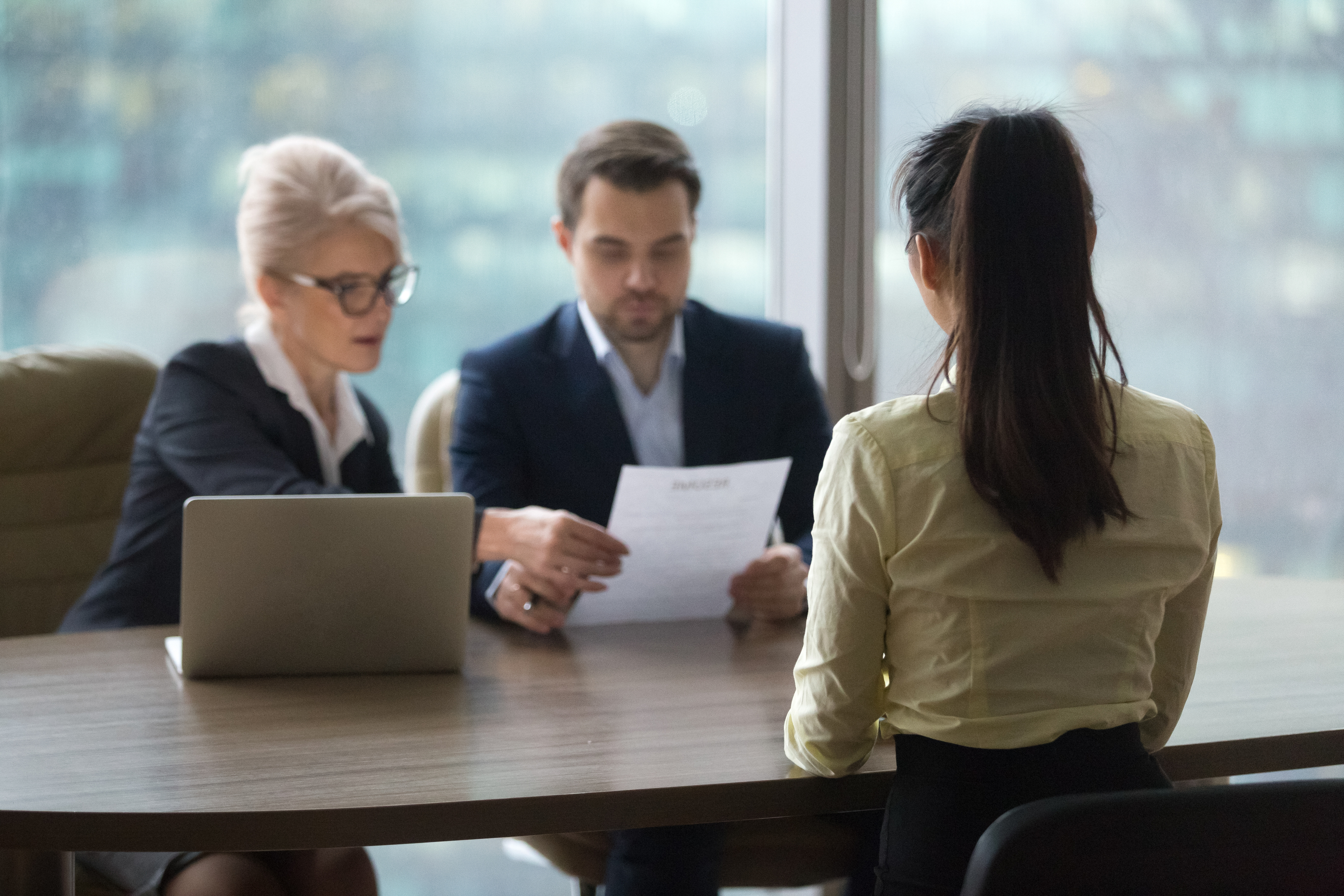 Female candidate interview with HR managers in office stock photo